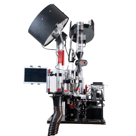 A full length view of The Revolution® press, with tablet, case feeder, bullet feeder, priming system and offload system.